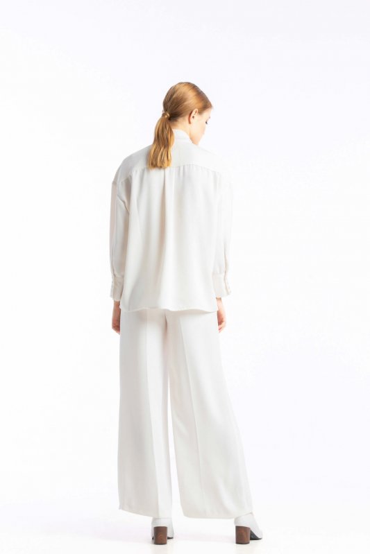 Блуза білого кольору з коміром-бантом  Фото 3