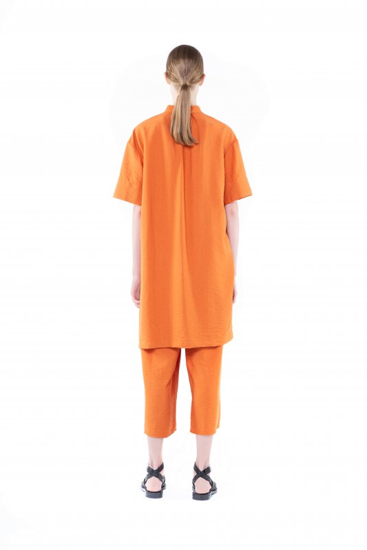 Льняные оранжевые брюки свободного кроя Фото 3