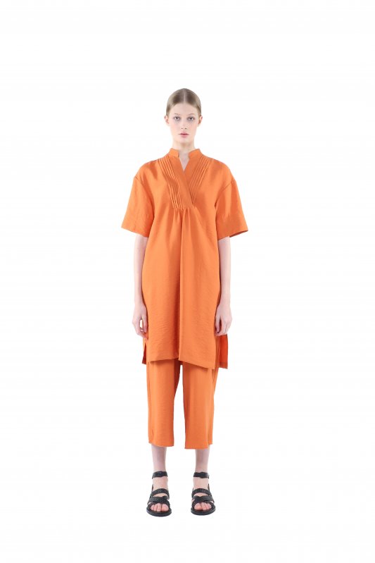 Льняные оранжевые брюки свободного кроя Фото 2