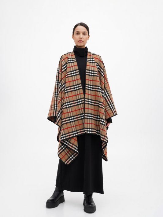 Пончо в яркую клетку с черным кантом Фото 2
